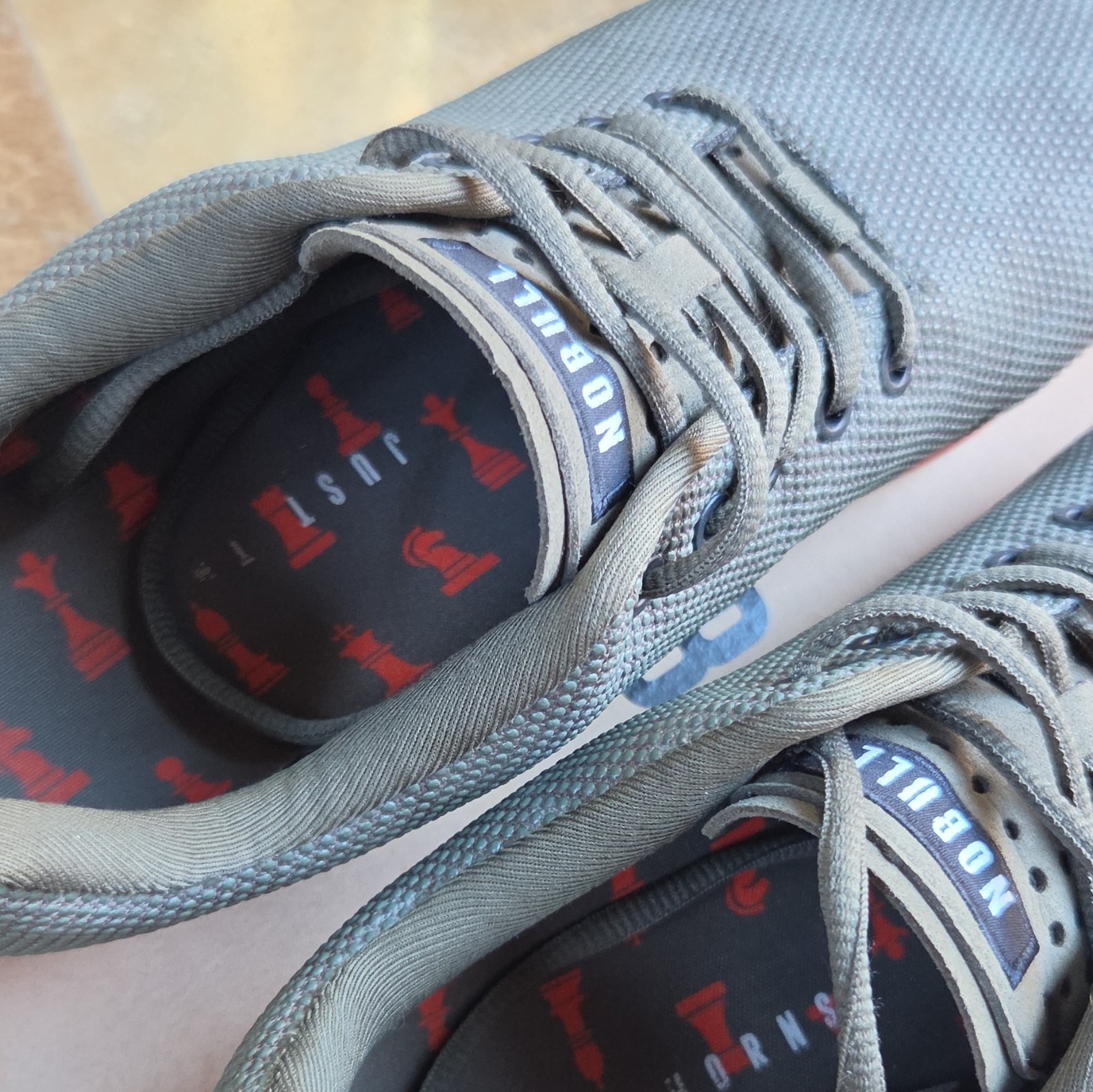 NOBULL SuperFabric Trainer Chess Pumpkin Gray/Orange Low Top Lace Up Sneaker