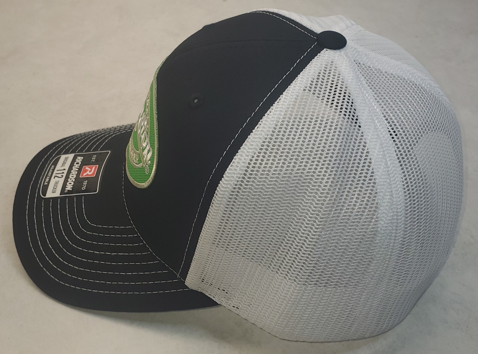 Remington Fire Arms Patch on Richardson 112 Trucker Hat Snapback Black/White
