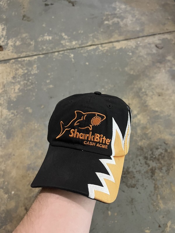 Vintage Black and Orange Shark Bite Cash Acme Snap Back Hat