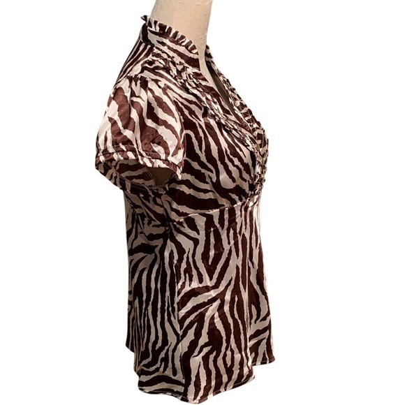 HEART SOUL. NWT. Zebra printed top. Cap sleeves. Lattice design w/frills. M. gallery